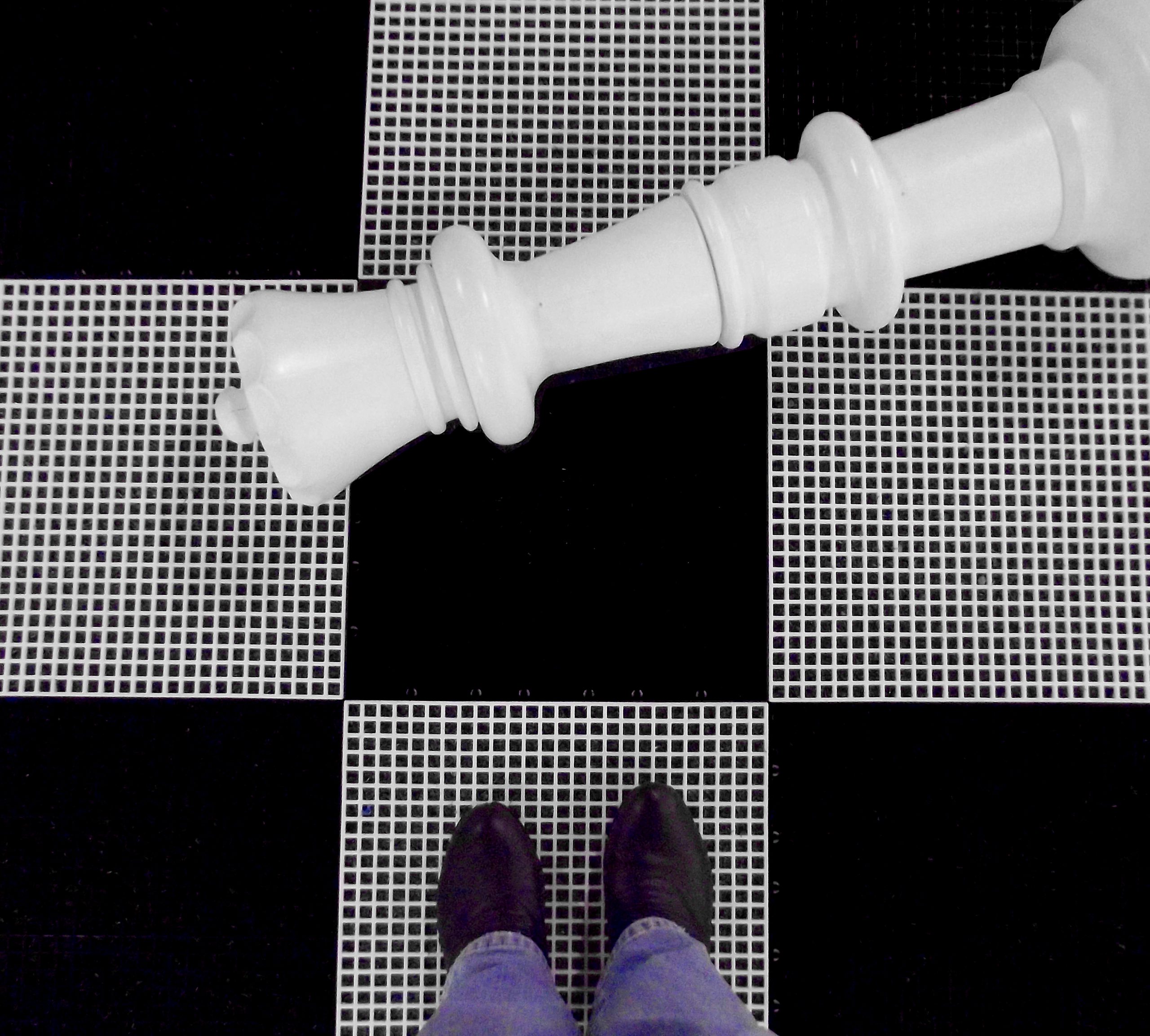 standing-on-a-giant-chess-board-9TE6GK5